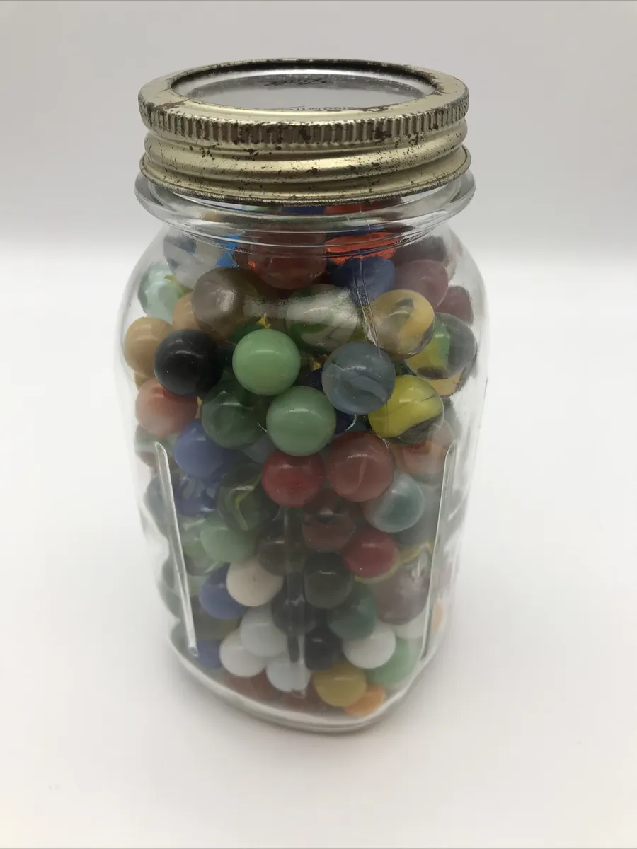 Quart jar filled with colorful marbles