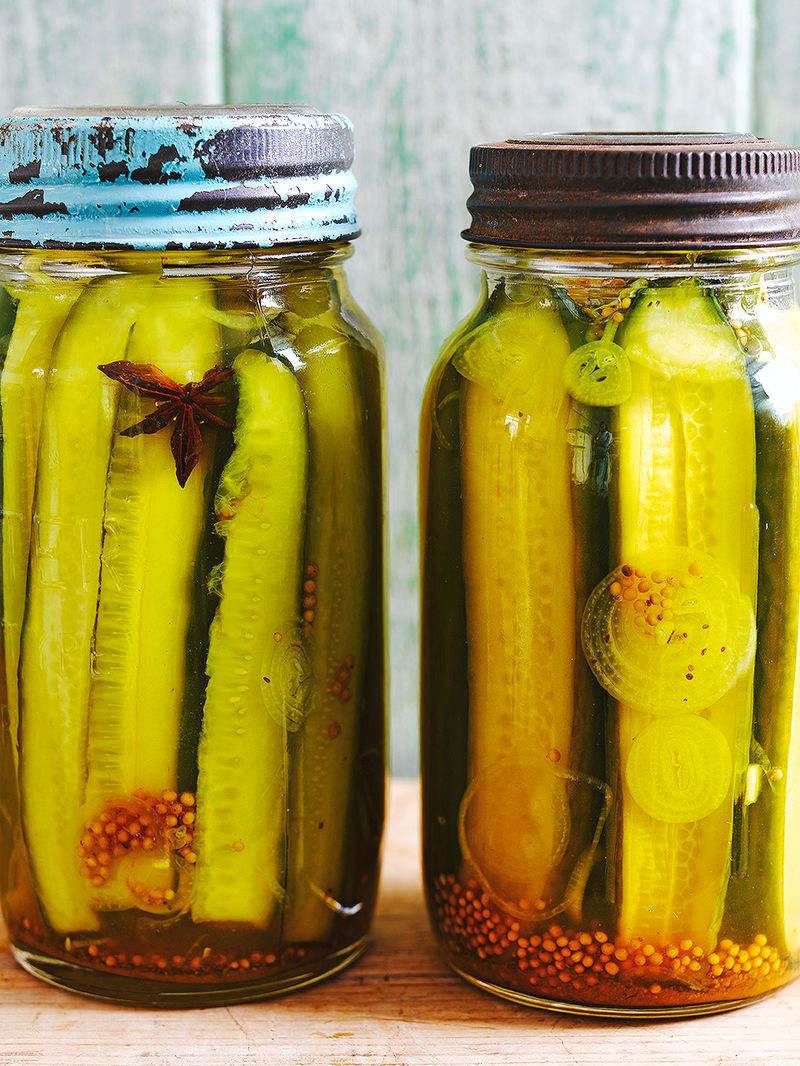 Before and after comparison of a cucumber and a pickled cucumber